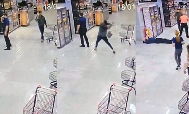 gerente de supermercado atacado com pá na cabeça