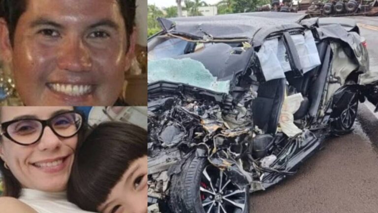 Cena de acidente grave em rodovia à noite, com um carro de passeio Toyota Corolla destruído entre dois caminhões, em Tupi Paulista, São Paulo.