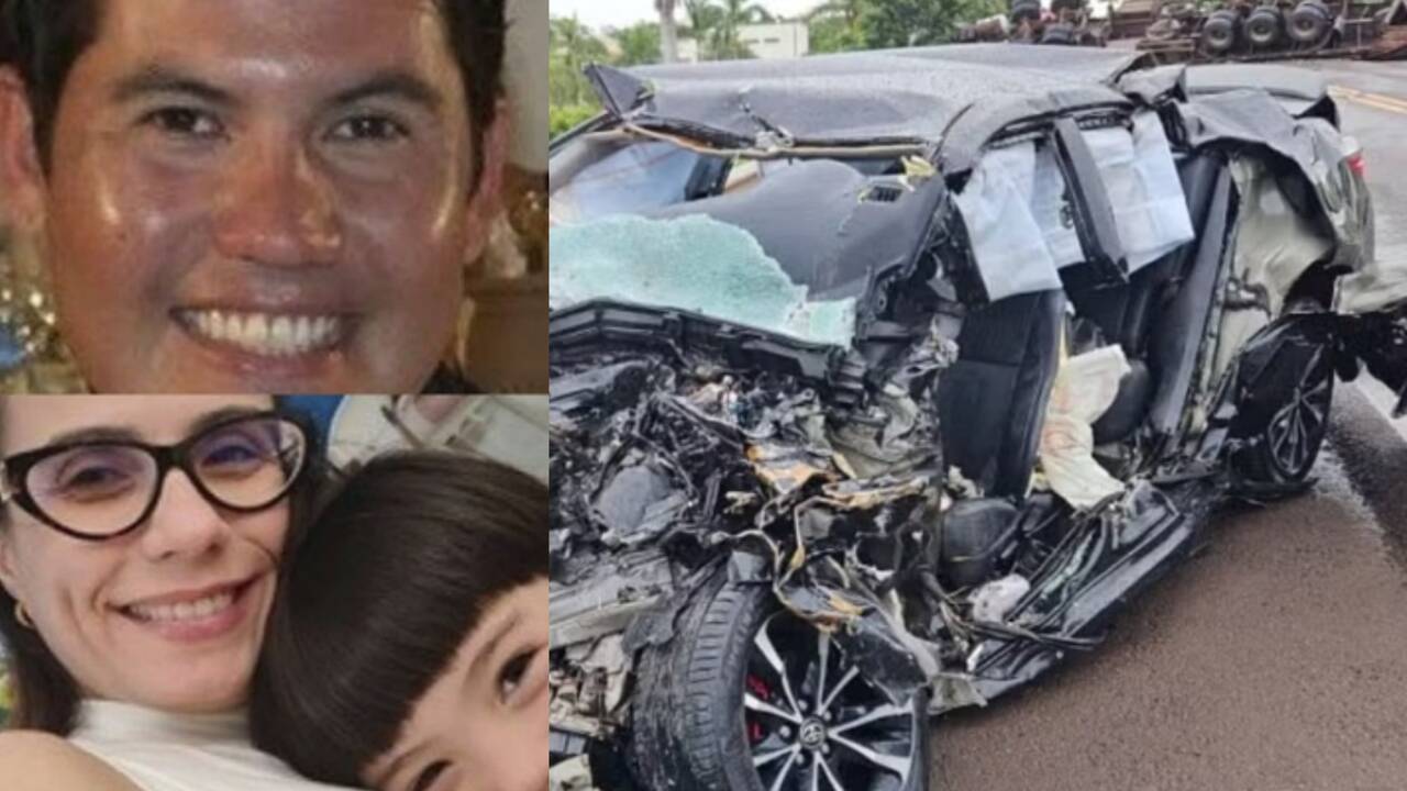 Cena de acidente grave em rodovia à noite, com um carro de passeio Toyota Corolla destruído entre dois caminhões, em Tupi Paulista, São Paulo.