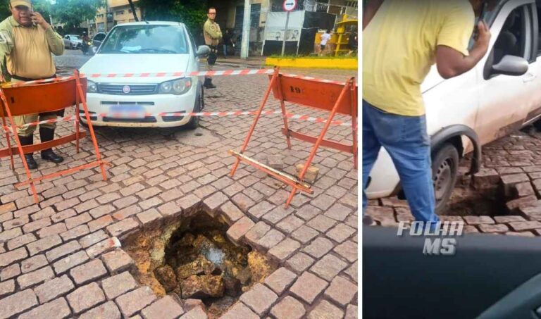 Tubulação da Sanesul rompe, abre cratera e engole parte de carro no Centro de Corumbá