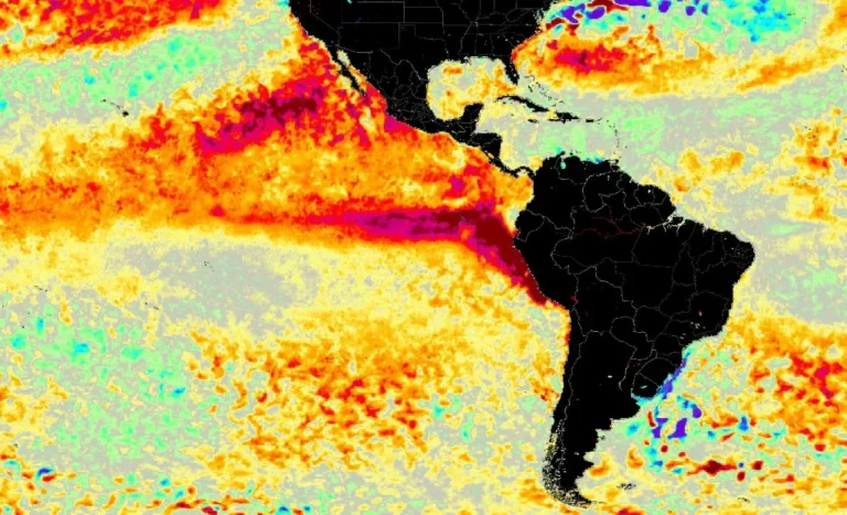 Mapa meteorológico mostrando anomalias de temperatura no Pacífico e previsão de chuva intensa na Região Sul do Brasil.