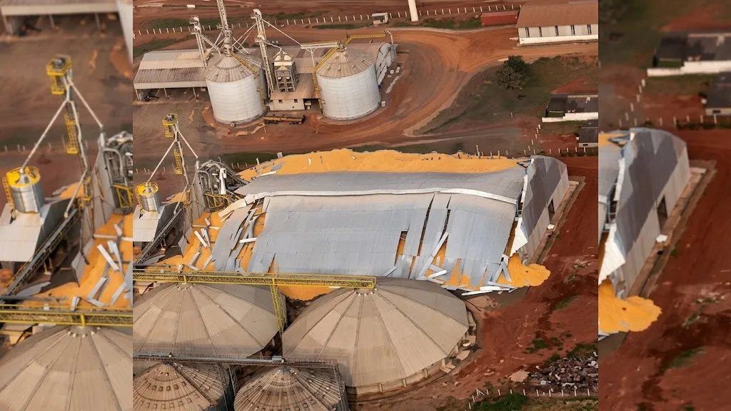 Vista aérea do armazém de grãos desabado em São Gabriel do Oeste, com grãos espalhados.