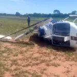 Helicóptero oficial de MS cai com quatro pessoas no aeroporto de Campo Grande